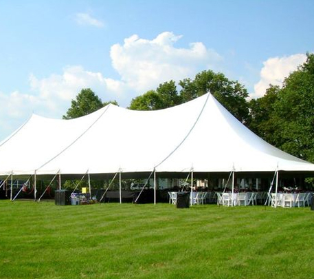 About us - Large Tent in Field